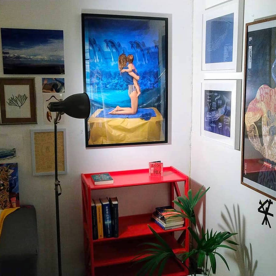 Limited edition print "Blue Planet" (2019) by Katrīna Ģelze on the wall of the Sea Library. Photo by Beach Books.